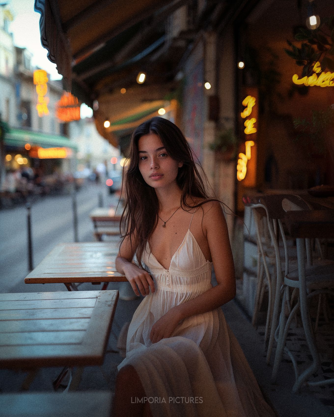 Limporia a color photograph of a simple young woman in her twe 47a1396b-b5b7-4455-b4a0-27ebe7ca664b